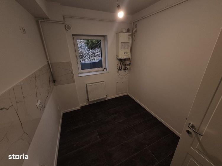 Apartament cu 7 camere decomandat în Bucium