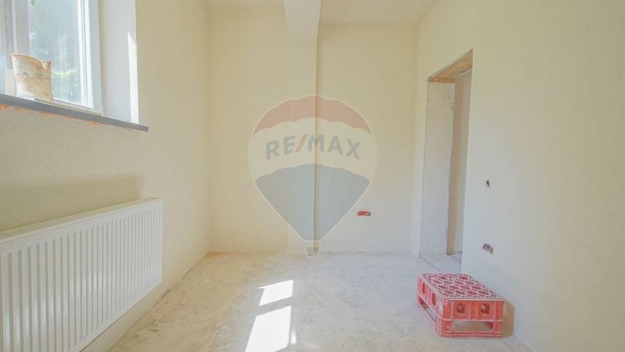 Casă cu 4 camere cu Teren 104 Mp în Centrul Civic