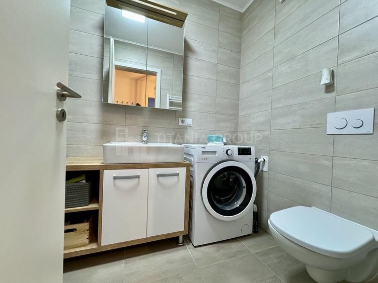 Apartament cu 2 camere semidecomandat, mobilat în Tractorul