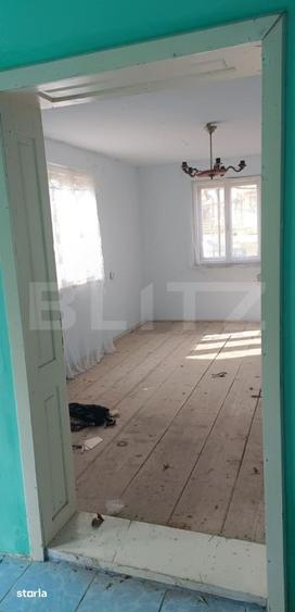 Casa cu 3 camere, bucatarie si baie, 105 mp si un teren de 1900 mp - 4