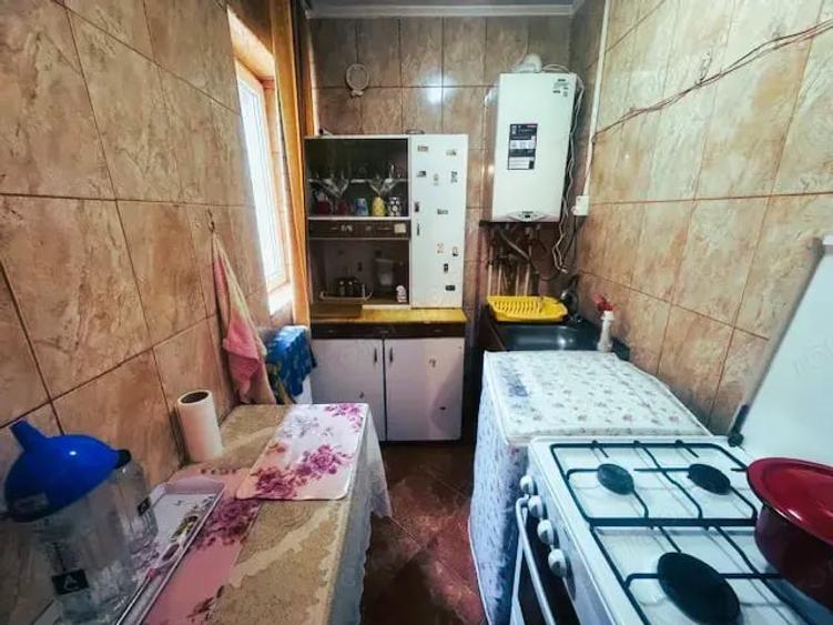 Apartament cu 4 camere decomandat în Drăgănești-Olt