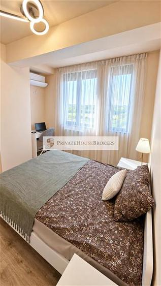 Apartament cu 3 camere semidecomandat, mobilat în Băneasa