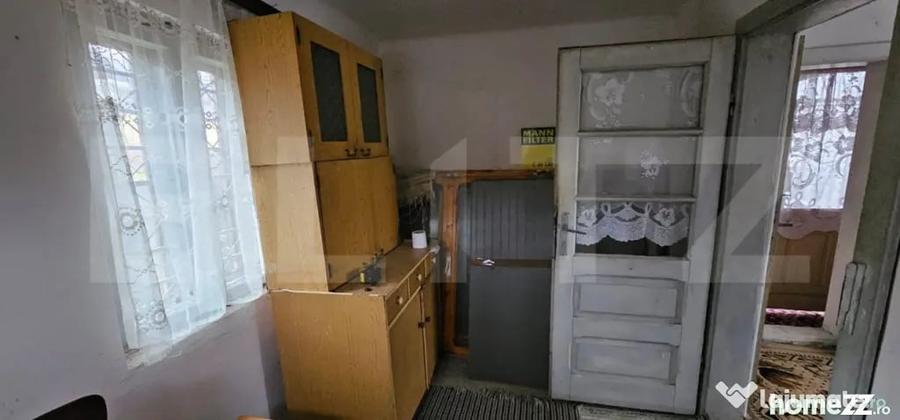 Casă cu 2 camere cu Teren 1200 Mp în Central