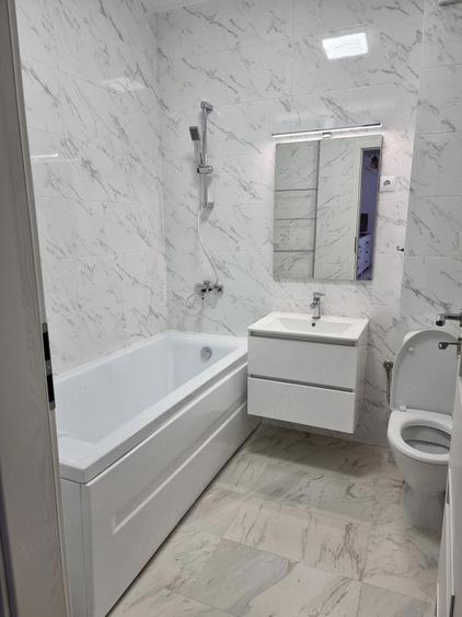 Ofer spre inchiriere apartament doua camere, bloc nou, cartier rezidential. Loc de parcare privat - 5