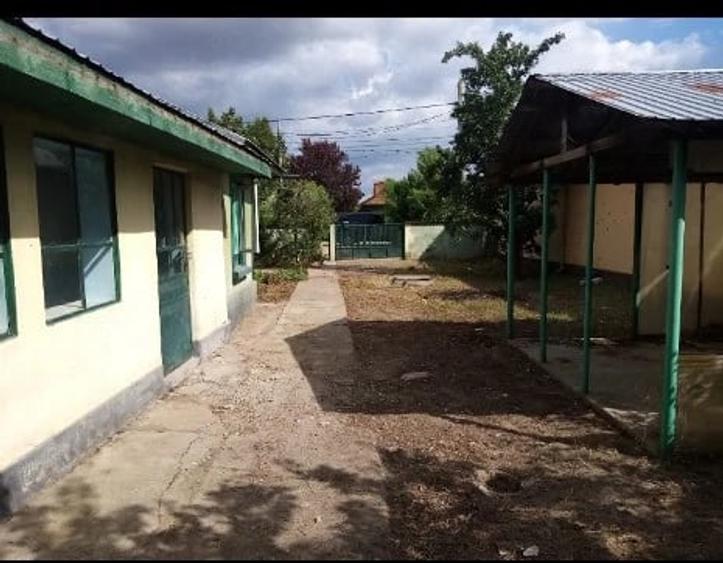 Casă cu Teren 1290 Mp în Central