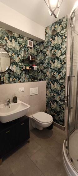 Apartament cu 3 camere decomandat în Tractorul
