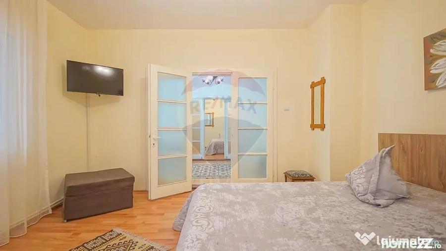 Casă cu 8 camere cu Teren 485 Mp în Central