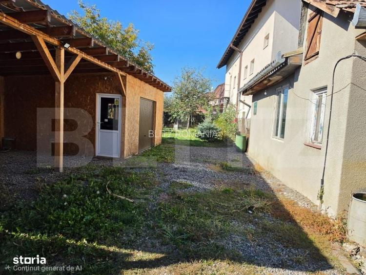 Casa 2 camere + garaj si dependinte - Teren 483mp - zona centrala