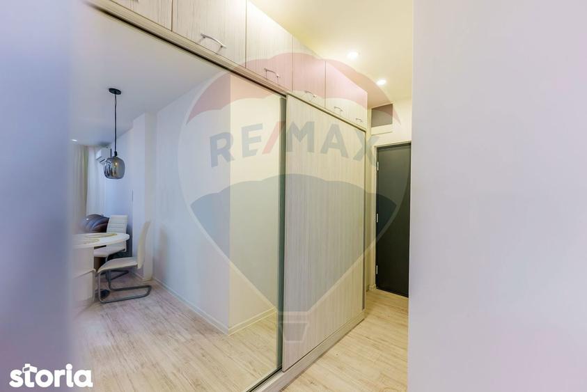 Apartament cu 2 camere semidecomandat, mobilat în Central