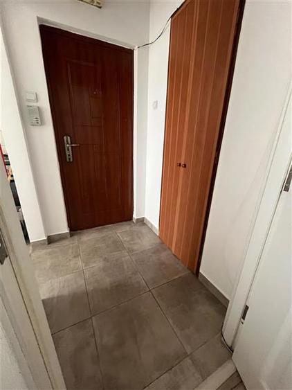Apartament cu 2 camere semidecomandat, mobilat în Tractorul