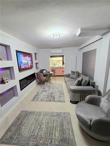 Apartament cu 3 camere semidecomandat, mobilat în Inel I