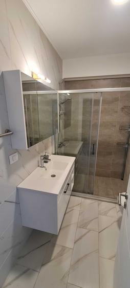 Apartament cu 2 camere semidecomandat, mobilat în Central