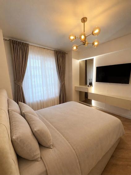 Apartament cu 2 camere decomandat, mobilat în Central