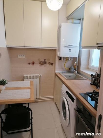 Apartament cu 2 camere semidecomandat în Buziașului