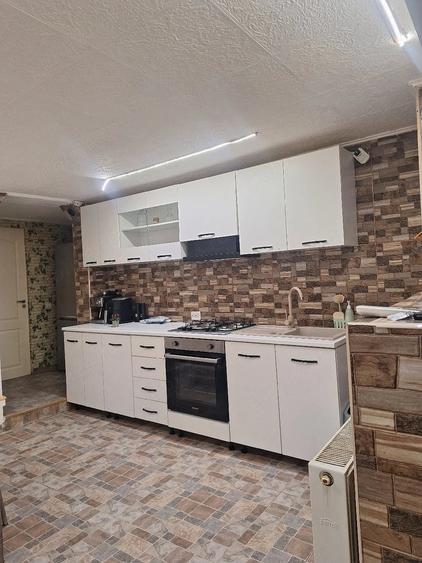 Casă cu Teren 601 Mp în Comana