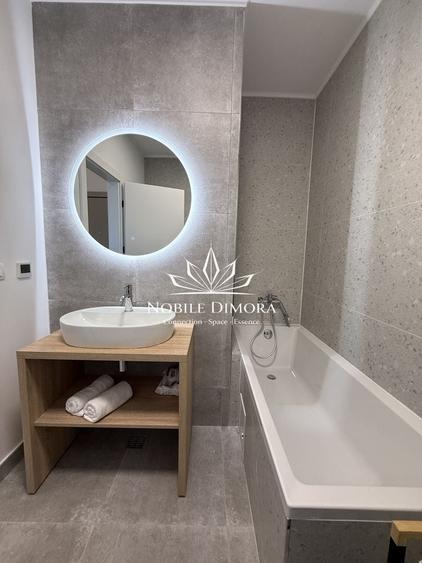 Apartament cu 2 camere semidecomandat, mobilat în Central