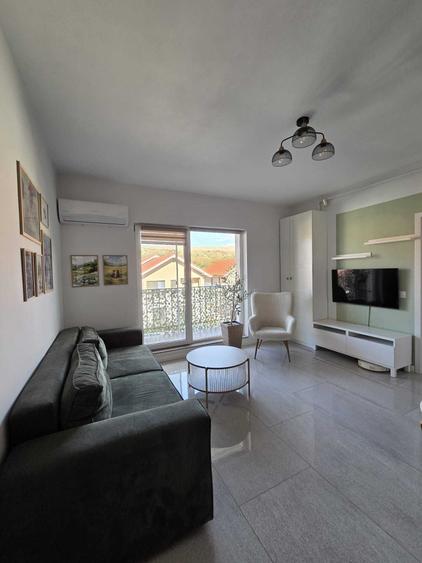 Apartament cu 2 camere semidecomandat în Chinteni