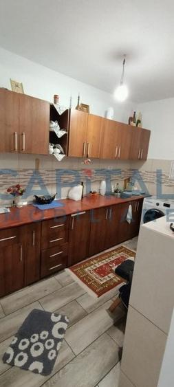 Constructie cu 3 apartamente + teren+ 2 spatii comerciale - 4