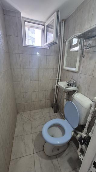 Garsonieră decomandată în Titan
