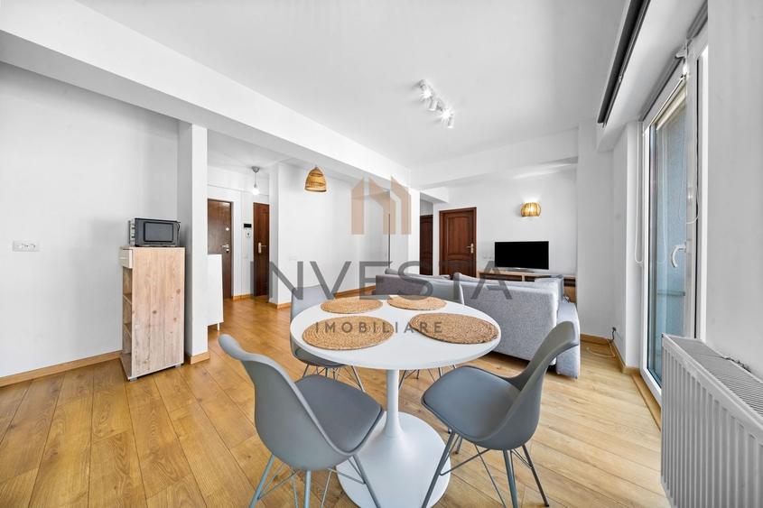 Apartament cu 3 camere semidecomandat, mobilat în Central