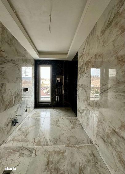 Casa 4 camere 237 mp, 4 bai, GARAJ, 700 mp teren- Bucium - 2