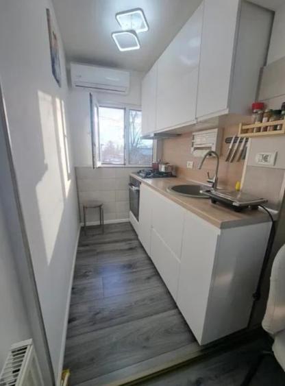 56000 euro -Garsoniera decomandata renovata- etaj 1 din 4 -bloc 1981 - 3