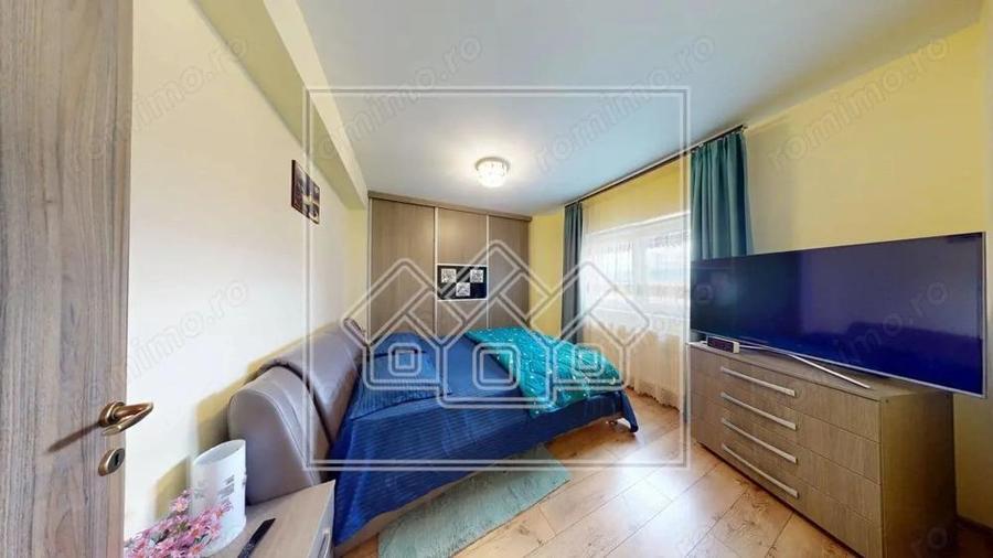 Ap.cu 3 camere, 2 bai si balcon, etaj intermediar, mobilat si utilat - 16