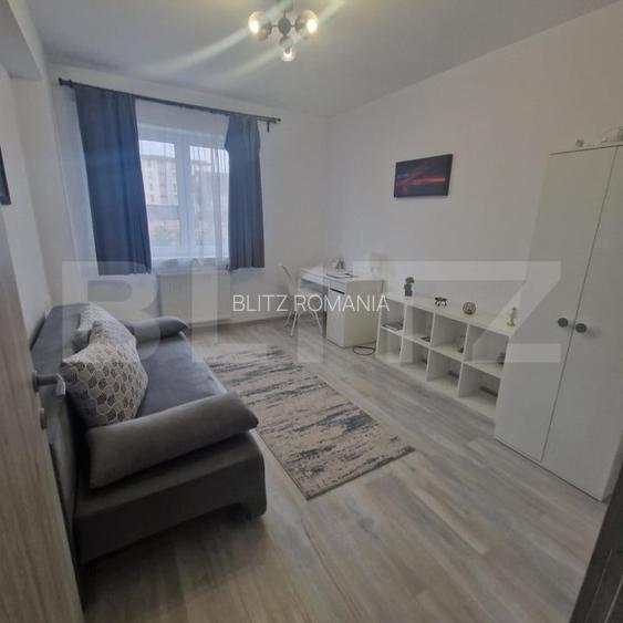 Apartament cu 3 camere, 76 mp, decomandat, loc de parcare - Tractorul