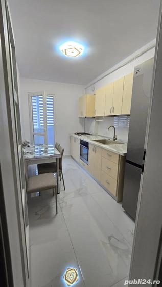 Inchiriez ap. 2 camere (loc parcare inclus) - 6