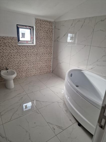 Sanmihaiul Roman - Casa individuala cu 4 camere si bucatarie inchisa - 11