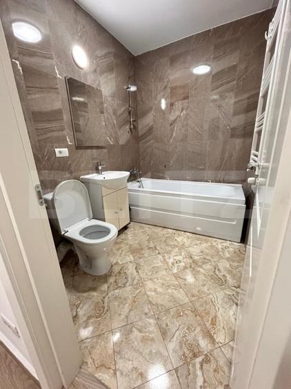 Garsonieră decomandată, mobilată în Bucium