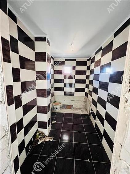Apartament cu 3 camere 2 bai situat in zona Rahovei din Sibiu - 9