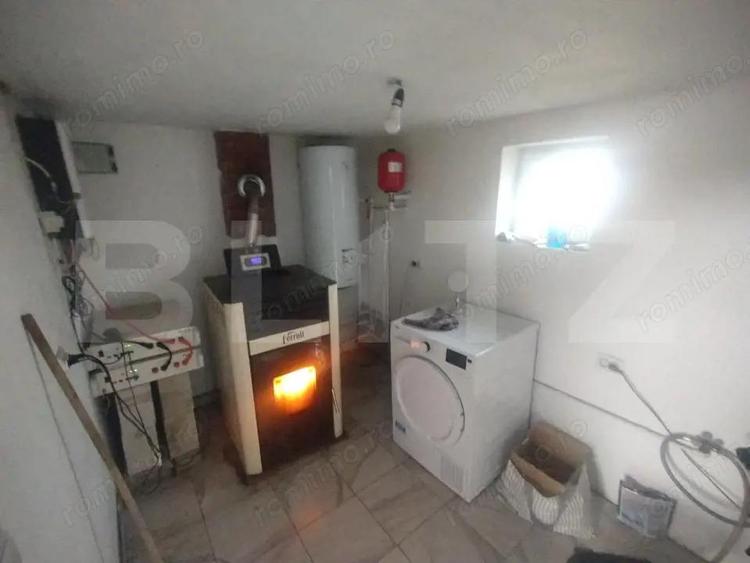 Casa pe 2 nivele cu 5 camere si 140 mp +teren 850 mp oras Beclean,zona Romfulda - 8