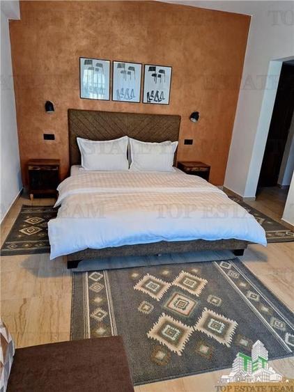 Pensiune premium de vanzare in Voronet - 1.610 mp utili, teren 1.021 mp, afacere - 3