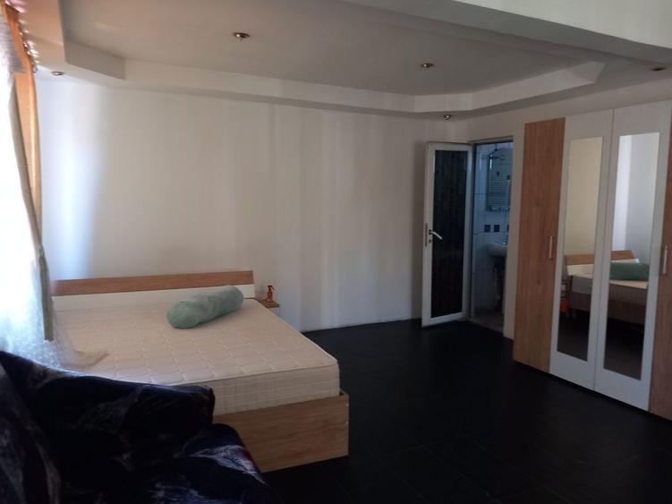 Inchiriez garsoniera casa la curte, sector 1 - 4