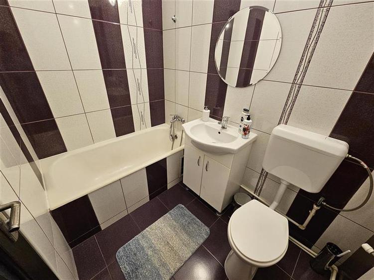 Garsoniera renovata in zona linistita Racadau - 8