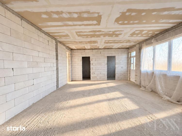 Casă cu 4 camere cu Teren 553 Mp în Sânmartin