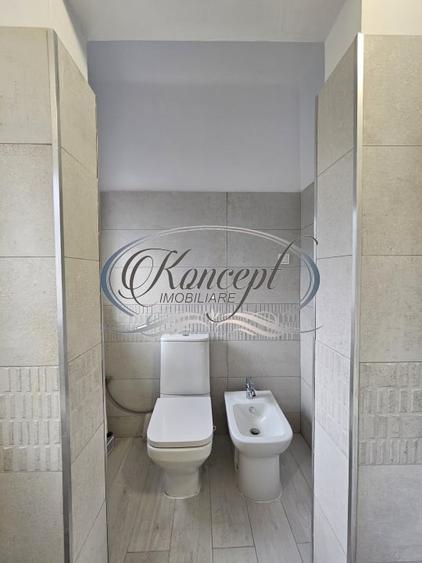 Proprietate renovata cu boxa generoasa pe Bulevardul 21 Decembrie - 9