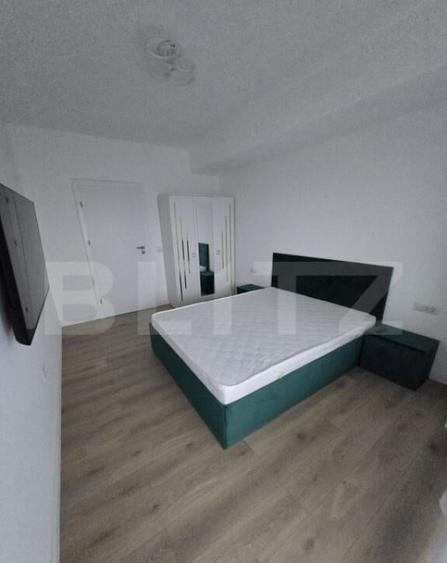 Apartament decomandat, 55mpu si 104 mp curte proprie, zona V - 2