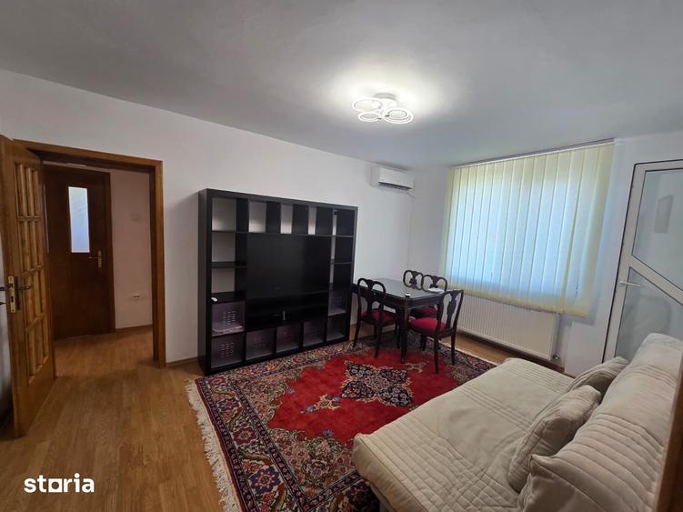 Apartament cu 3 camere semidecomandat, mobilat în Titan