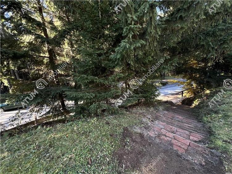 Pensiune de 7 camere cu 5 bai si teren de 377mp situata in Paltinis - 19