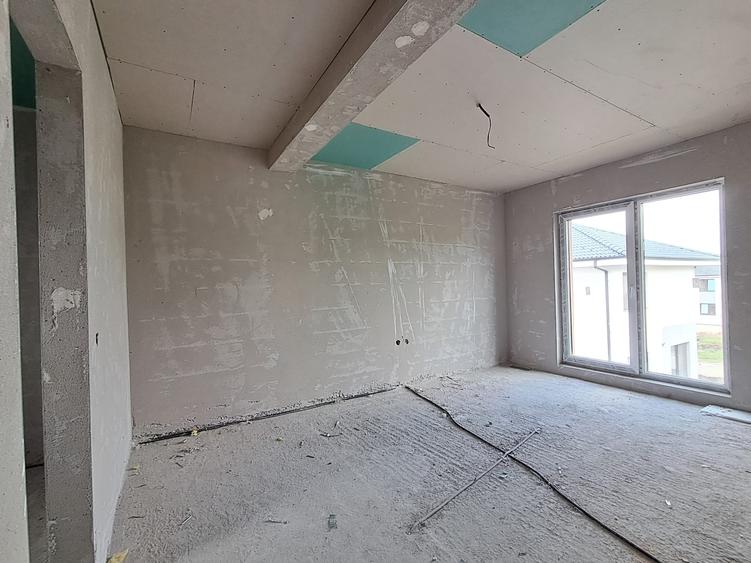 Casa cuplata prin garaj 23 mp, sup. totala 147 mp P+E in Chinteni - 10