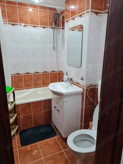 Ofer spre inchiriere apartament cu trei camere, renovat, mobilat si utilat - 9