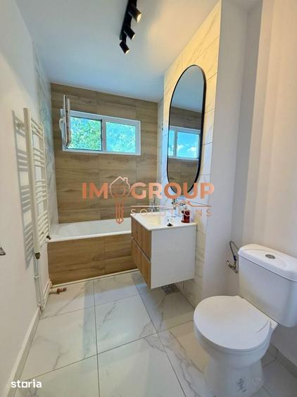 Apartament cu 3 camere semidecomandat în Podu Roș