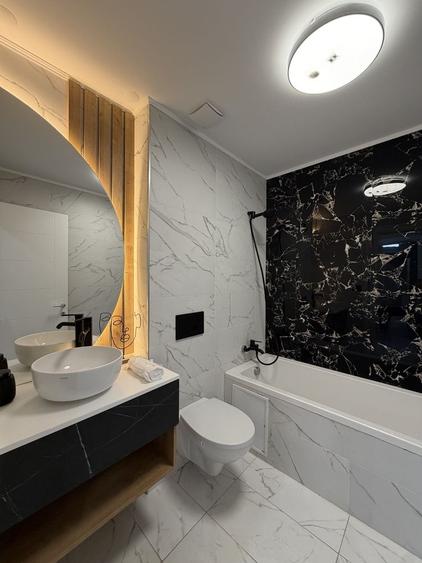 Apartament cu 3 camere decomandat în Tunari