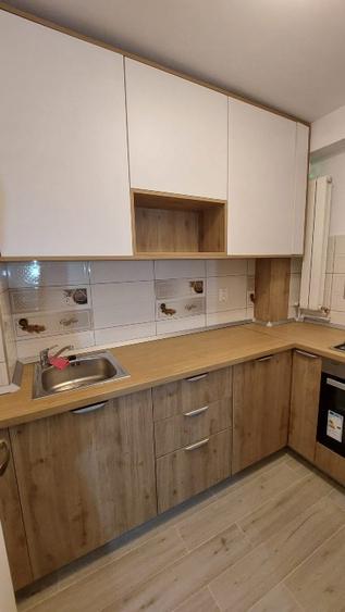 Proprietar, inchiriez garsoniera complet renovata si mobilata modern - 11