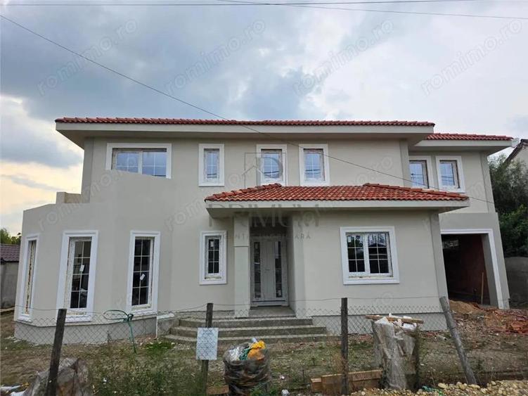 Casa individuala superba - teren 730 mp - garaj - 5 dormitoare - living 57mp. - 1