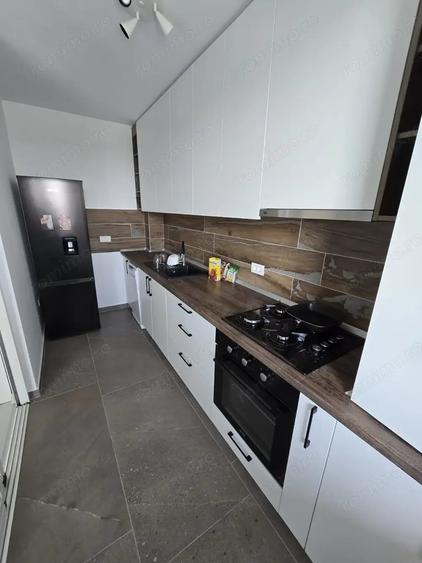 Apartament cu 2 camere semidecomandat, mobilat în Moșnița Nouă
