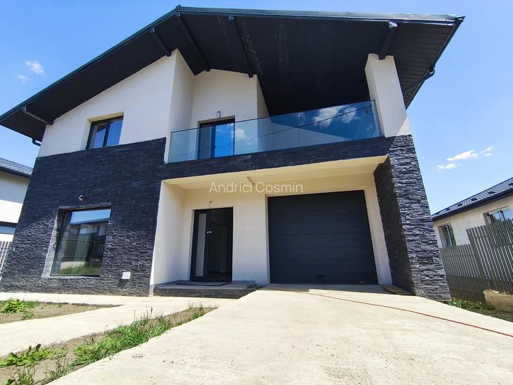 Casa cu garaj interior, Tomesti