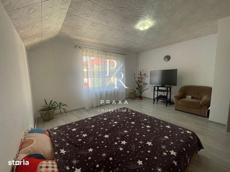 Casa individuala, impreuna cu spatiu comercial amplasata pe un teren d - 6